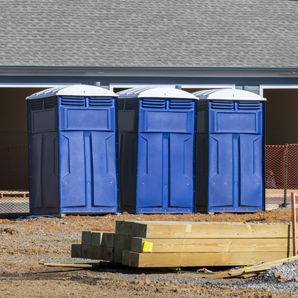 what is the cost difference between standard and deluxe portable restroom rentals in Wake